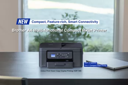 A compact all-in-one inkjet printer on a work desk, ideal for small office and home use.