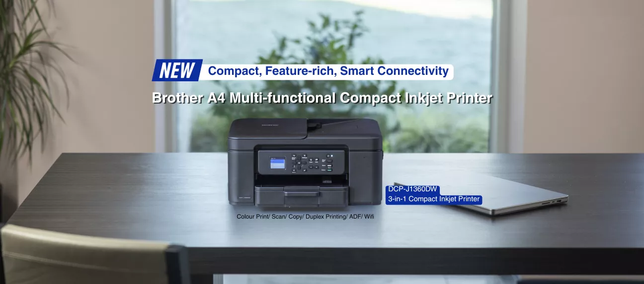 A compact all-in-one inkjet printer on a work desk, ideal for small office and home use.